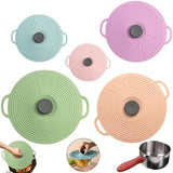 Silicone stretch lids in five sizes, with one sealing a mixing bowl
