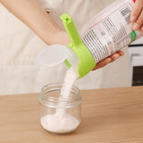 Pouring sugar from a sealed bag into a glass jar through the clip spout