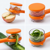 Orange vegetable peeler with the storage box collecting apple and cucumber peel